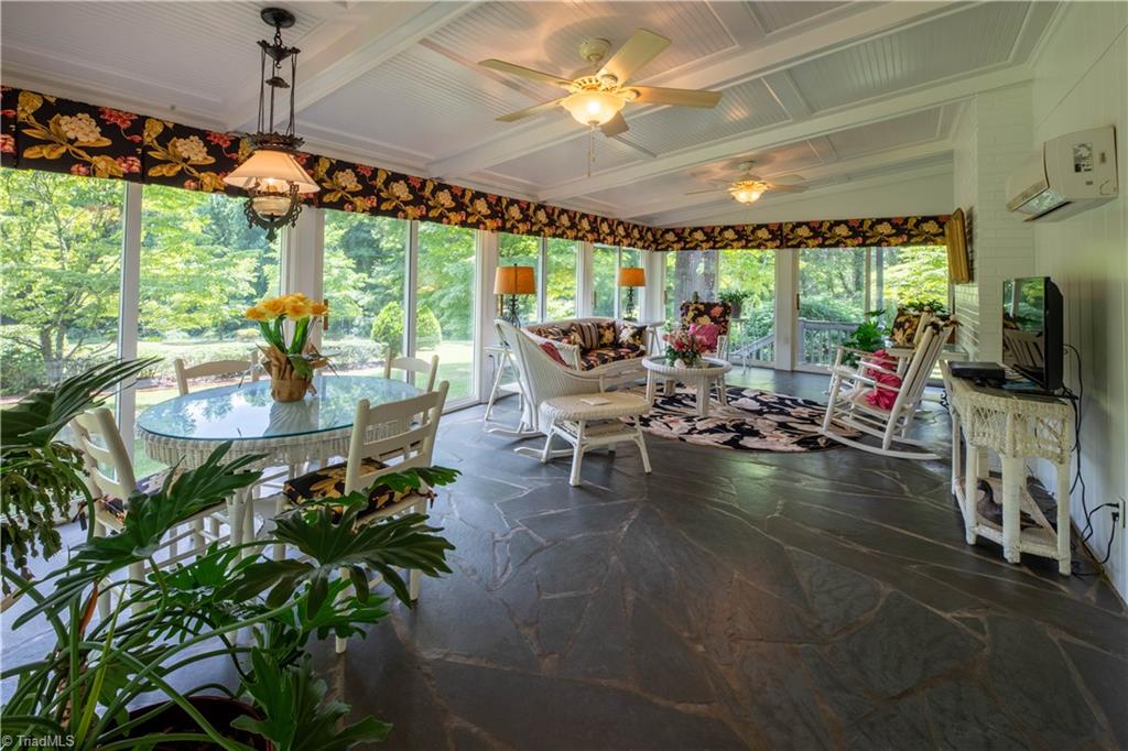 559 Welcome-Arcadia Road Lexington, NC 27295 - Photo 10 of 37 Sunroom on the back of the house is heated and cooled.