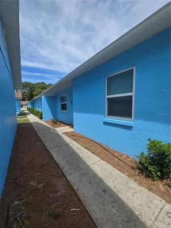 a house view with a outdoor space