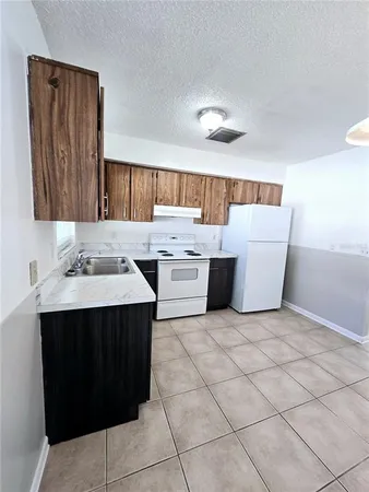 a kitchen with a cabinets and a sink