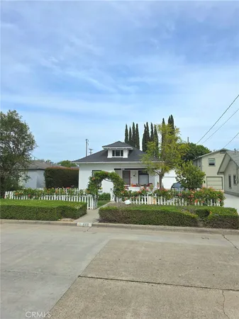 front view of a house with a street