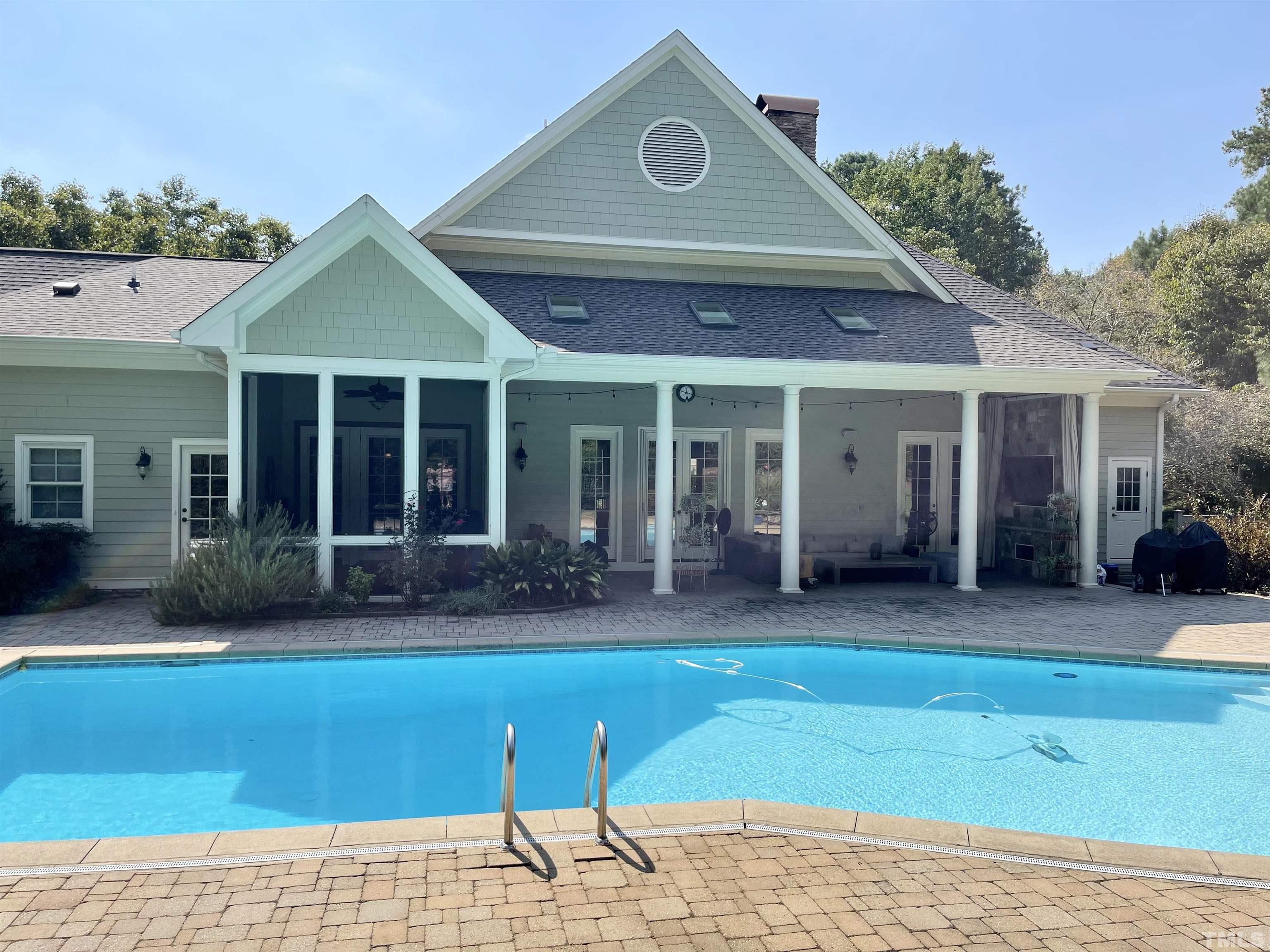 5204 Atherton Bridge Road Raleigh, NC 27613 - Photo 1 of 27 a front view of a house with a yard