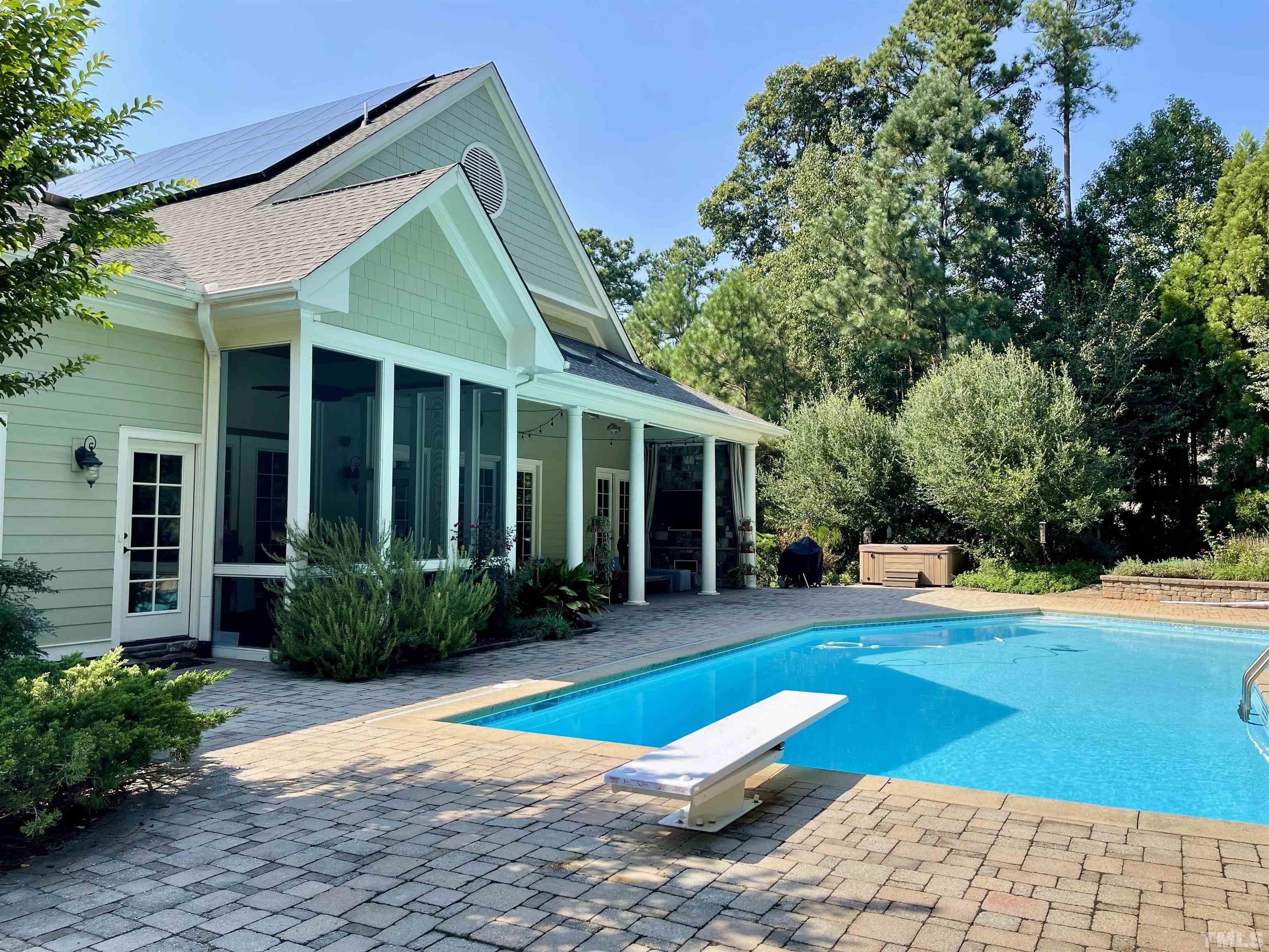 5204 Atherton Bridge Road Raleigh, NC 27613 - Photo 2 of 27 a view of a house with backyard and sitting area