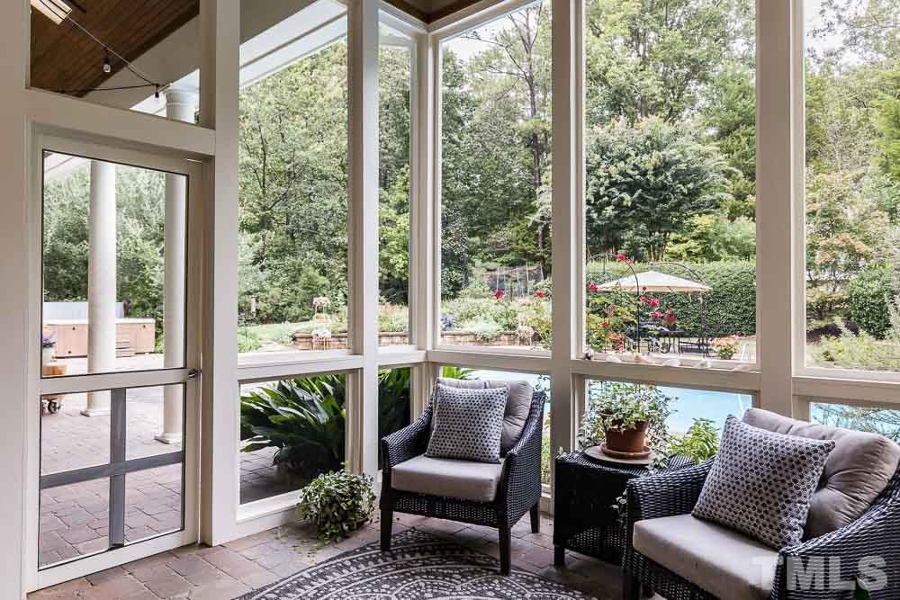 5204 Atherton Bridge Road Raleigh, NC 27613 - Photo 12 of 27 a living room with furniture and windows