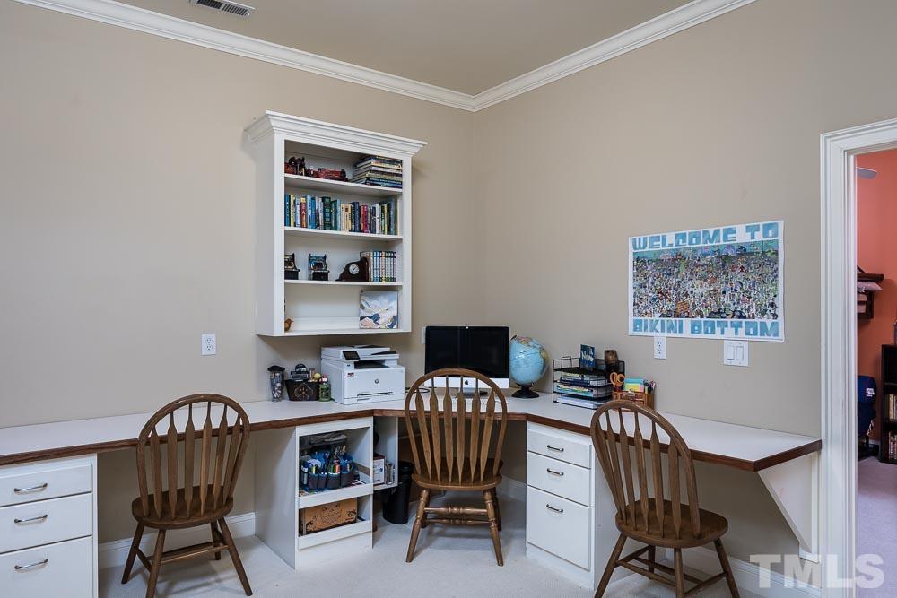 5204 Atherton Bridge Road Raleigh, NC 27613 - Photo 25 of 27 a view of a dining room with furniture