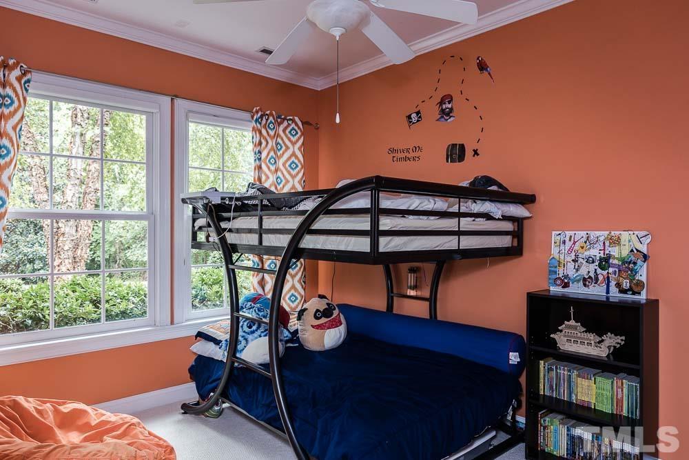 5204 Atherton Bridge Road Raleigh, NC 27613 - Photo 26 of 27 a bedroom with furniture and window