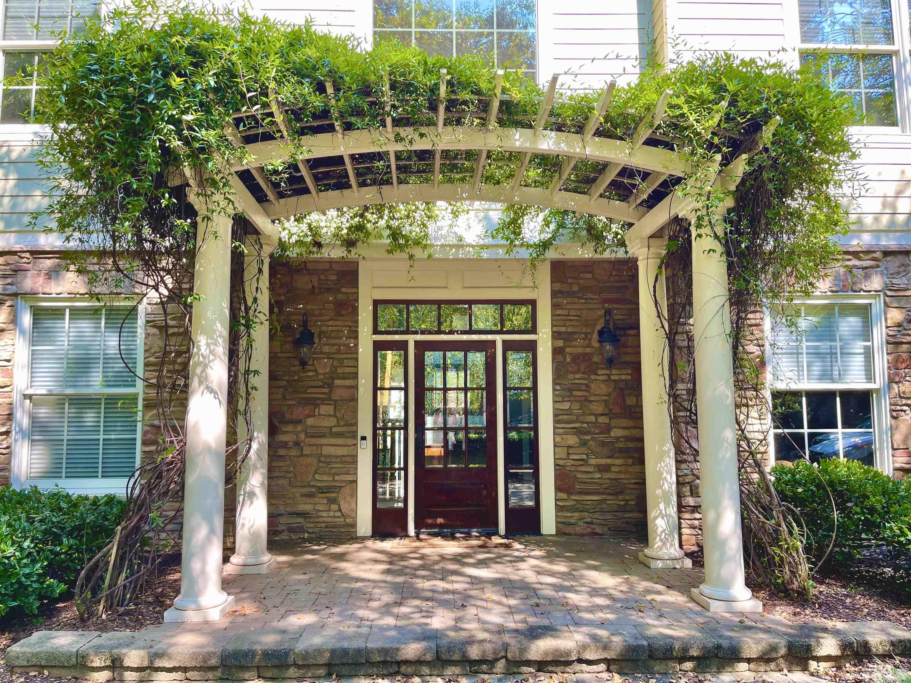 5204 Atherton Bridge Road Raleigh, NC 27613 - Photo 5 of 27 a front view of a house with a porch