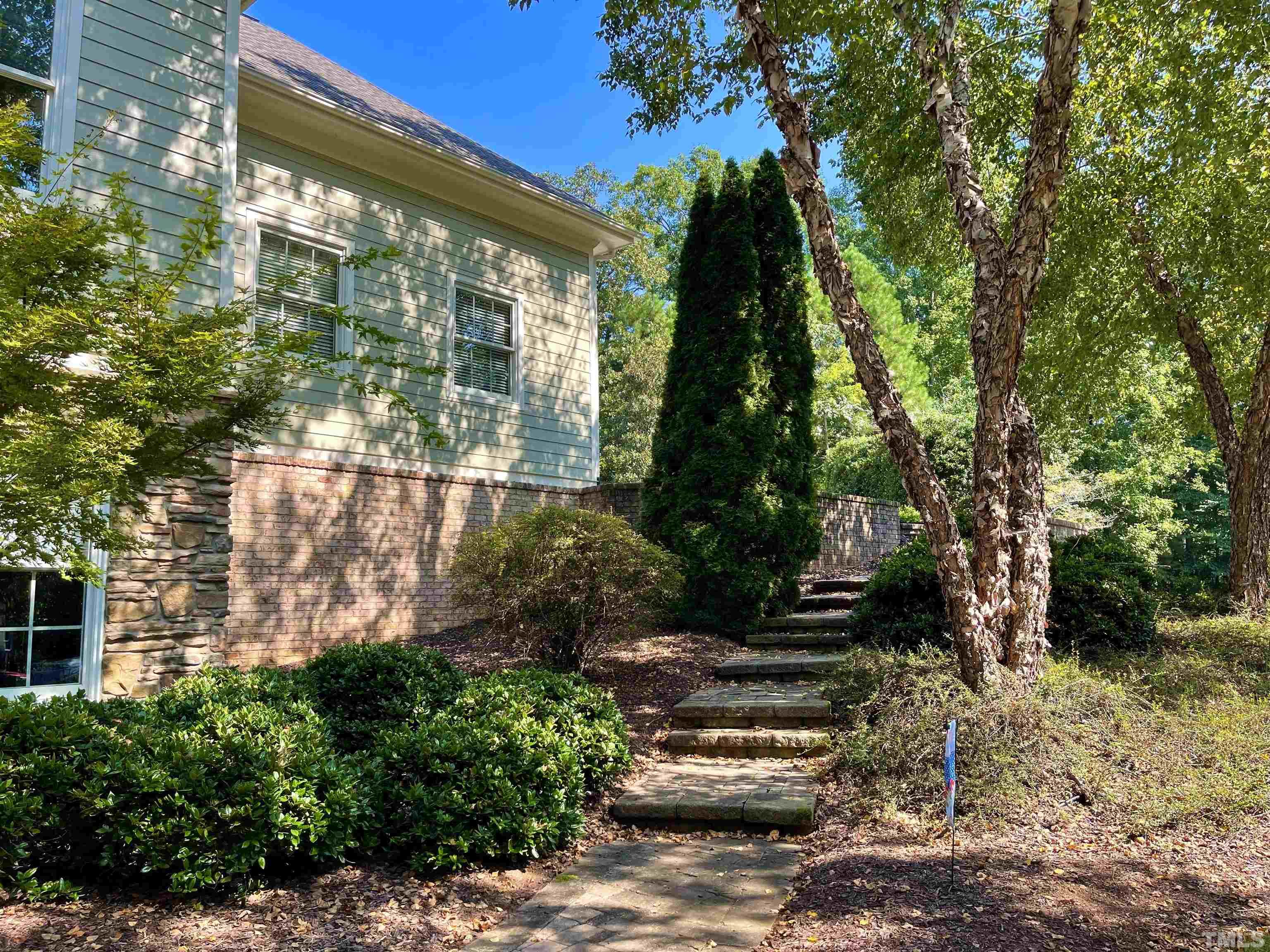 5204 Atherton Bridge Road Raleigh, NC 27613 - Photo 6 of 27 a view of a back yard