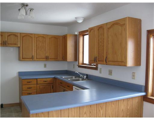 24 Harriman Road Orland, ME 04472 - Photo 4 of 12 Kitchen. Blank spot is for a range,...