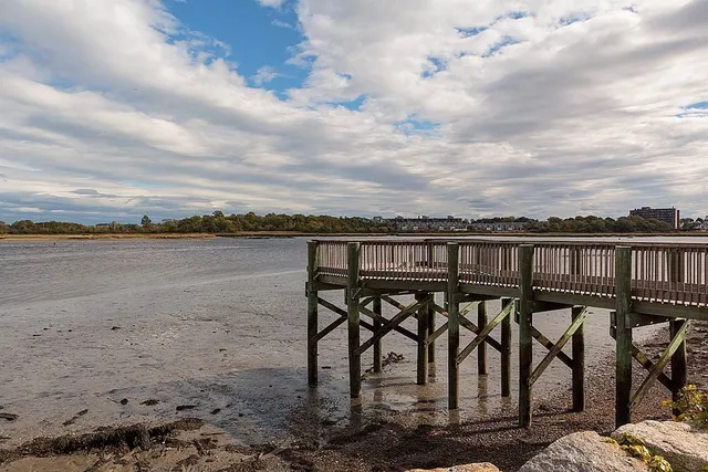 a view of a terrace with outdoor seating and barbeque