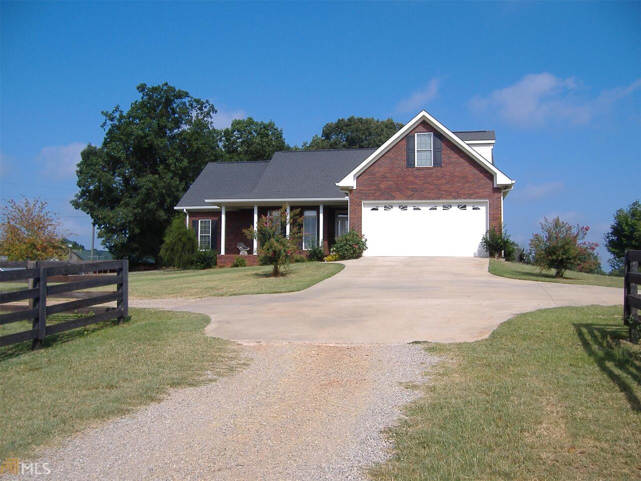 500 Freedom Church Road Royston, GA 30662 - Photo 1 of 1 a front view of a house with a yard