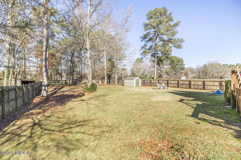 128 Springwood Court Macon, GA 31210 - Photo 20 of 21 a view of yard with trees
