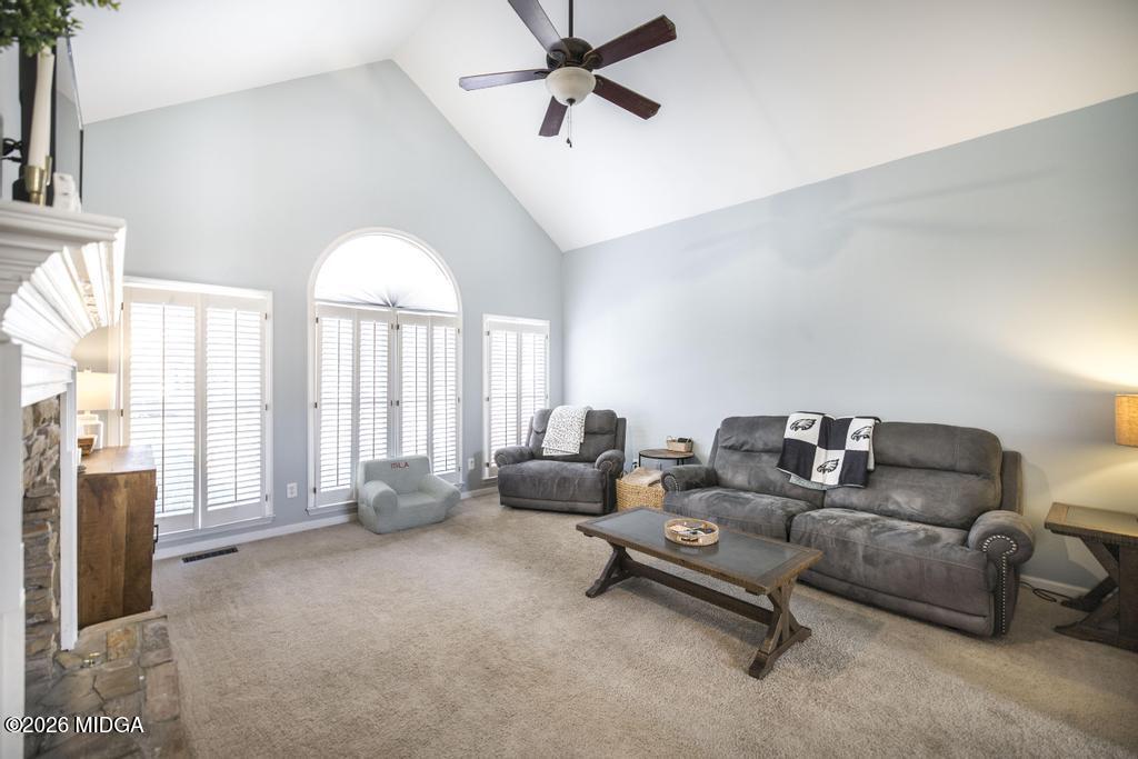 128 Springwood Court Macon, GA 31210 - Photo 3 of 21 a living room with furniture and a large window