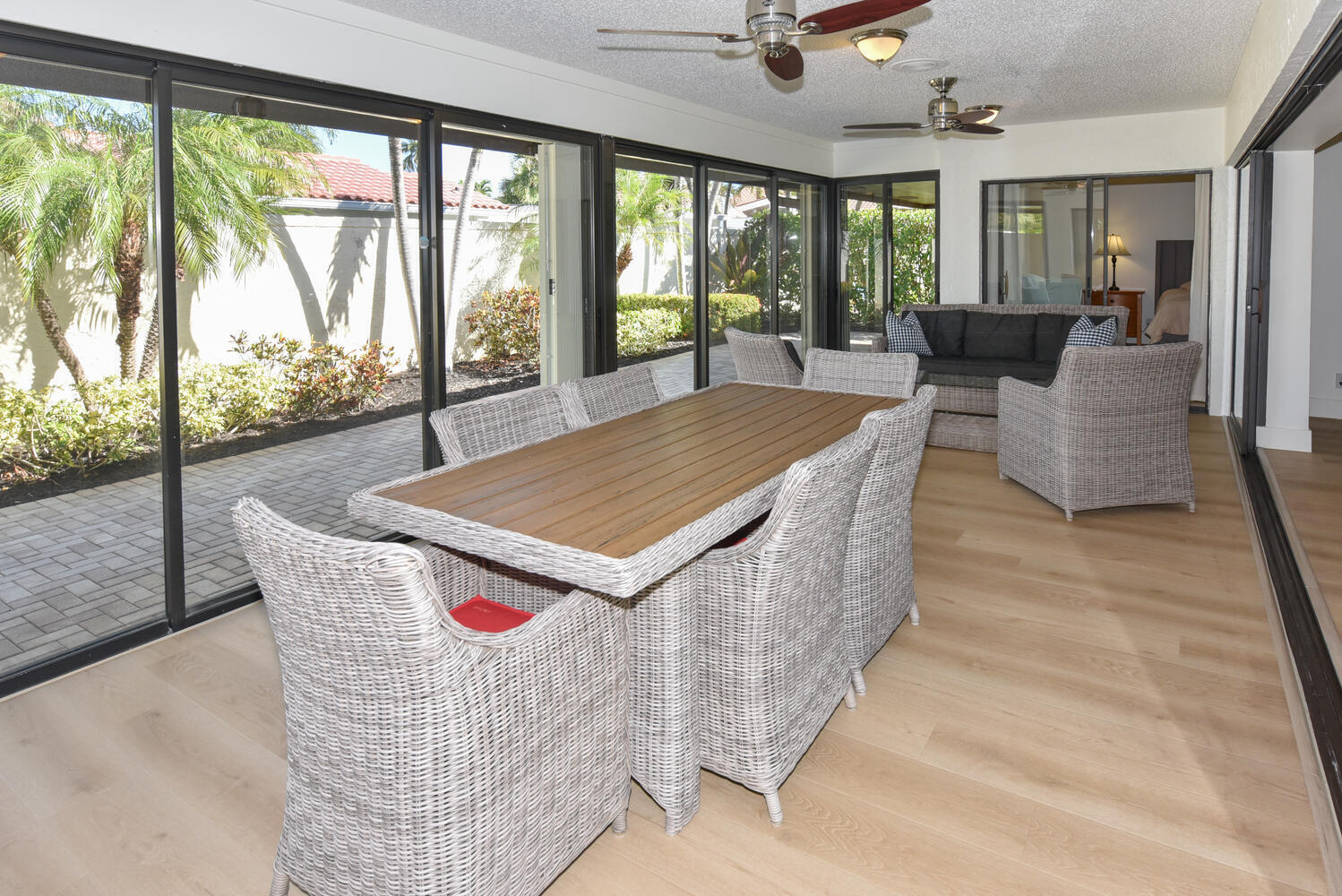 1469 Vía Privada Jupiter, FL 33477 - Photo 11 of 38 a living room with furniture and large windows