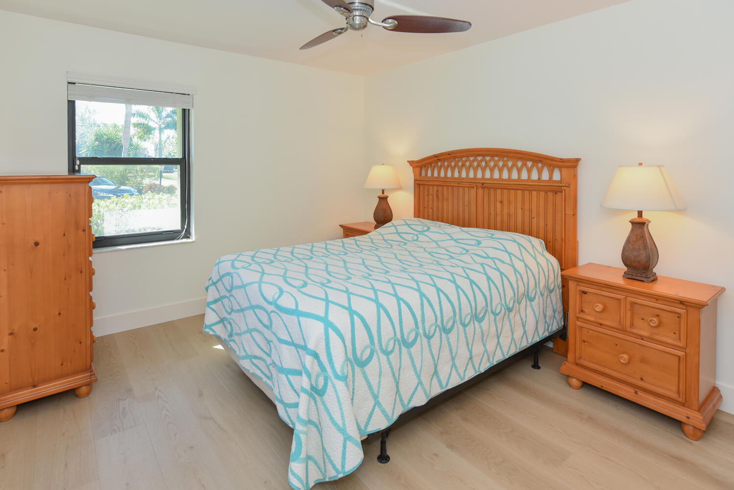 1469 Vía Privada Jupiter, FL 33477 - Photo 26 of 38 a bedroom with a bed and window