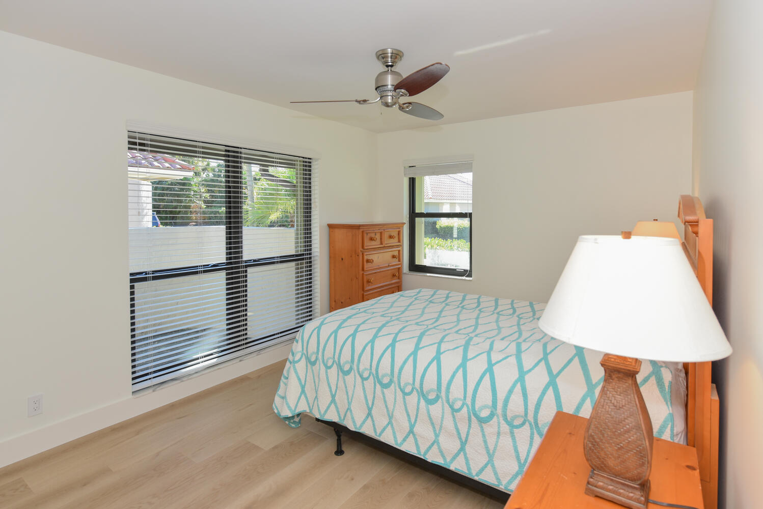 1469 Vía Privada Jupiter, FL 33477 - Photo 27 of 38 a bedroom with a bed and window