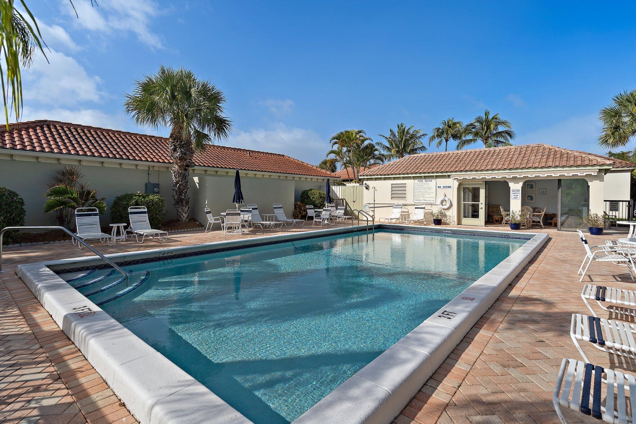 1469 Vía Privada Jupiter, FL 33477 - Photo 34 of 38 a view of a house with swimming pool
