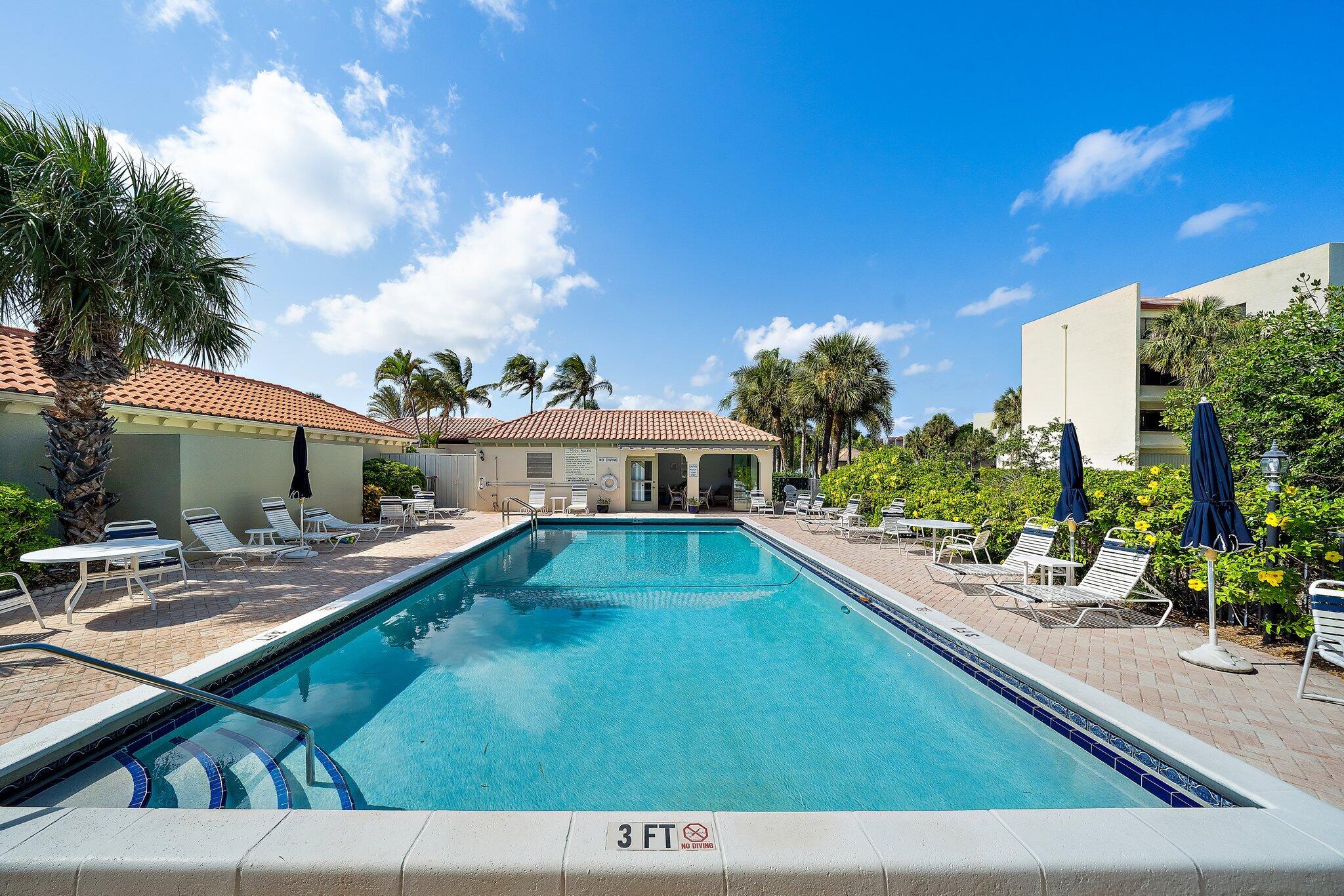 1469 Vía Privada Jupiter, FL 33477 - Photo 36 of 38 a view of house with swimming pool outdoor seating