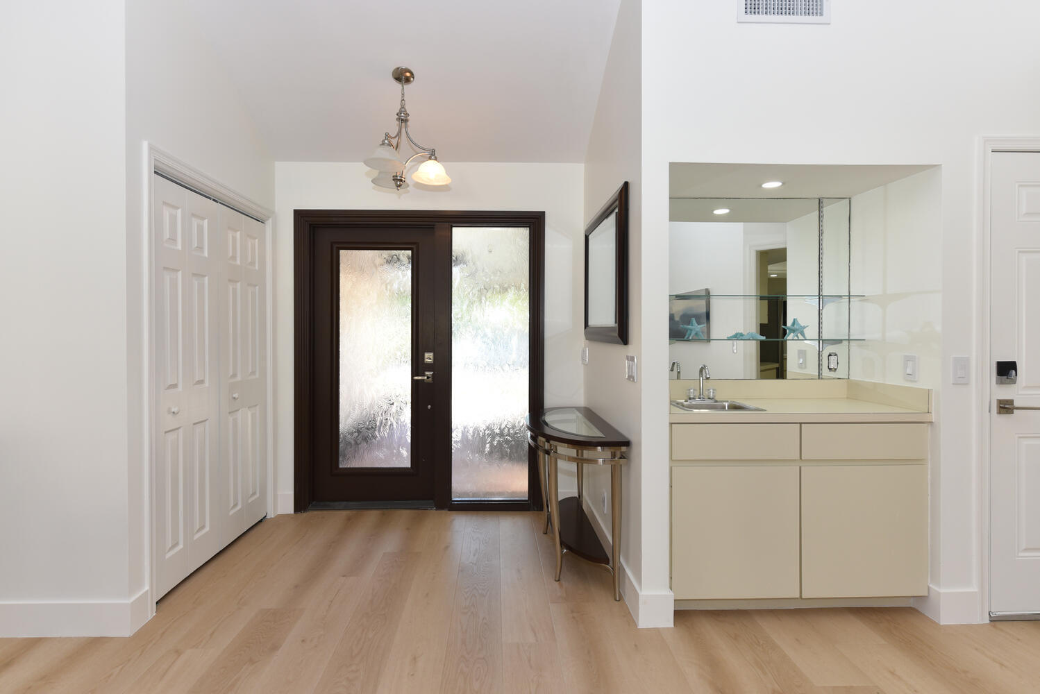 1469 Vía Privada Jupiter, FL 33477 - Photo 6 of 38 a bathroom with a sink and a mirror