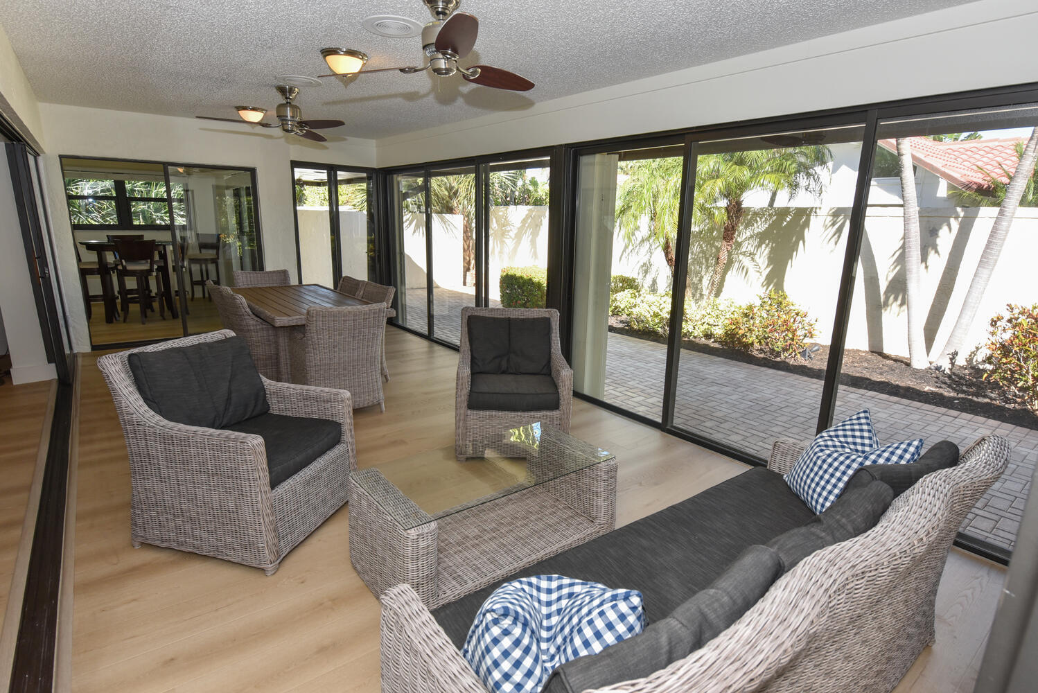 1469 Vía Privada Jupiter, FL 33477 - Photo 9 of 38 a living room with furniture and a large window