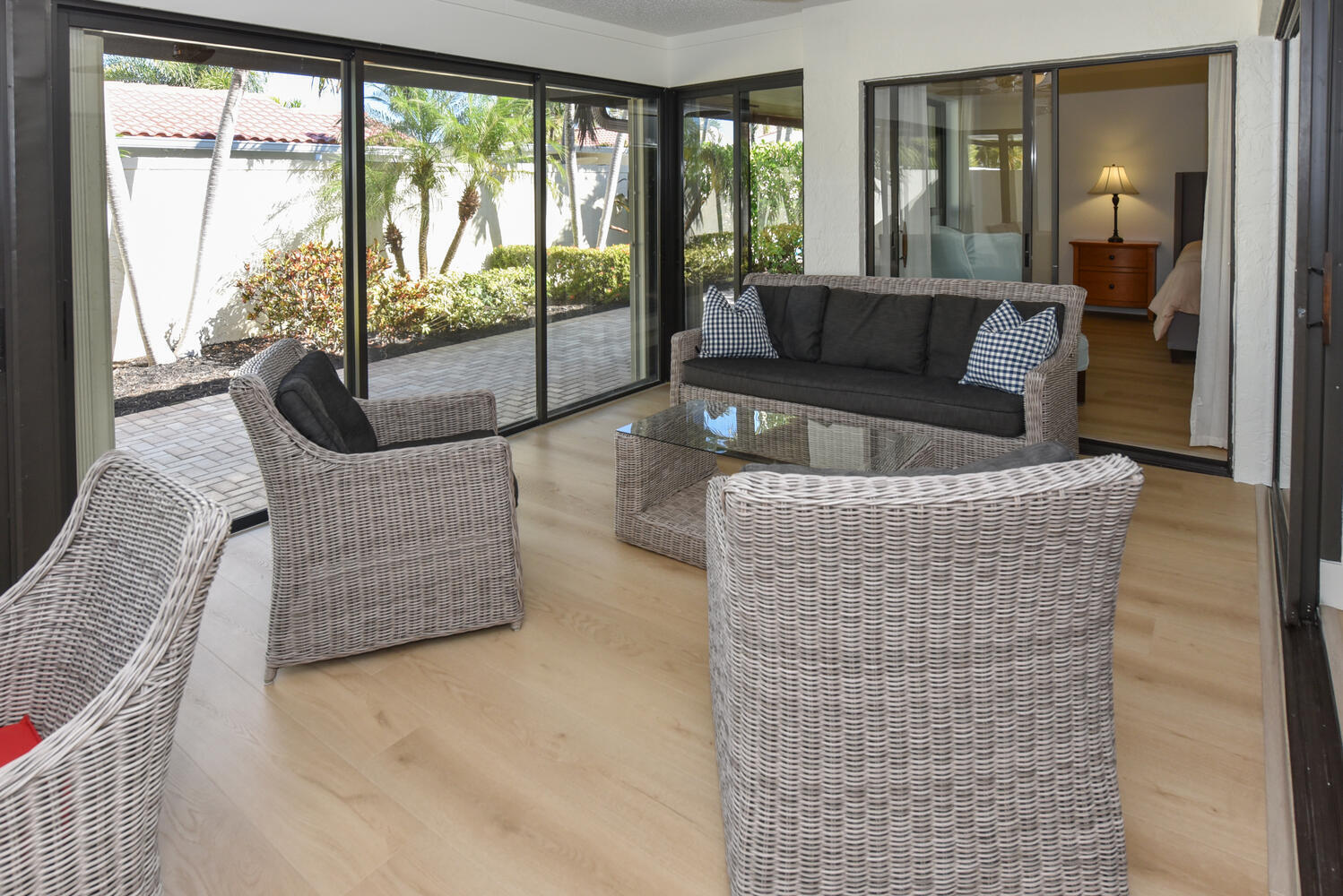 1469 Vía Privada Jupiter, FL 33477 - Photo 10 of 38 a living room with furniture and a floor to ceiling window