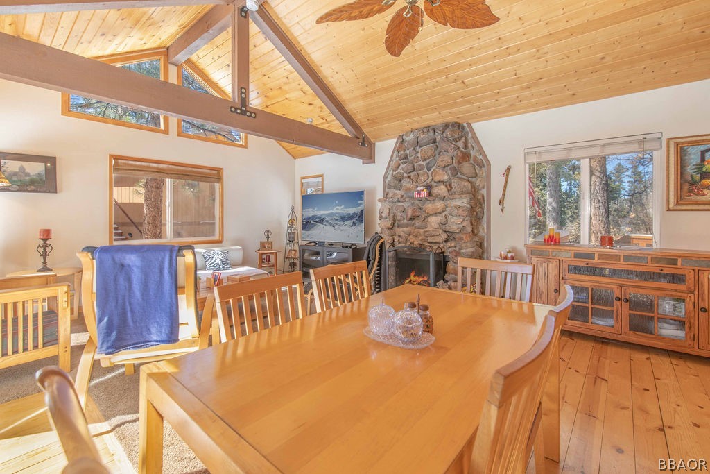 43132 Moonridge Road Big Bear Lake, CA 92315 - Photo 14 of 41 a view of a dining room with furniture and a chandelier