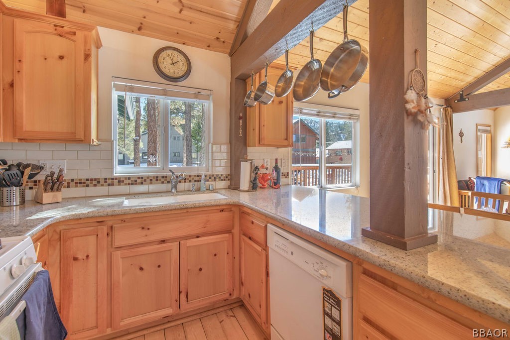 43132 Moonridge Road Big Bear Lake, CA 92315 - Photo 16 of 41 a view of a kitchen with a sink and a large window