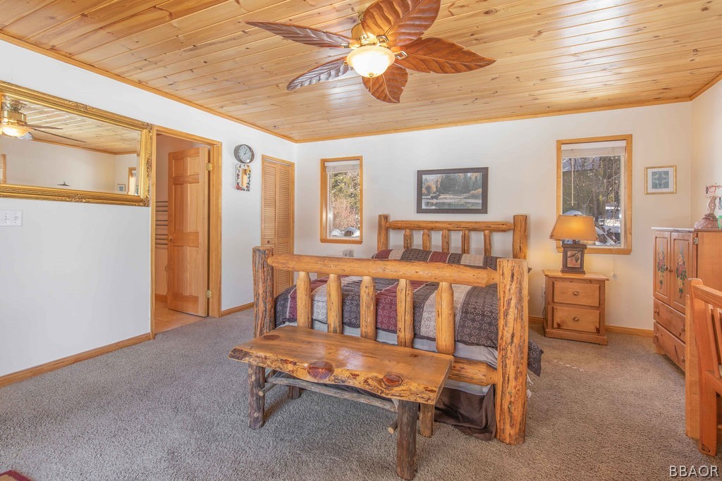 43132 Moonridge Road Big Bear Lake, CA 92315 - Photo 21 of 41 a bedroom with furniture and a ceiling fan