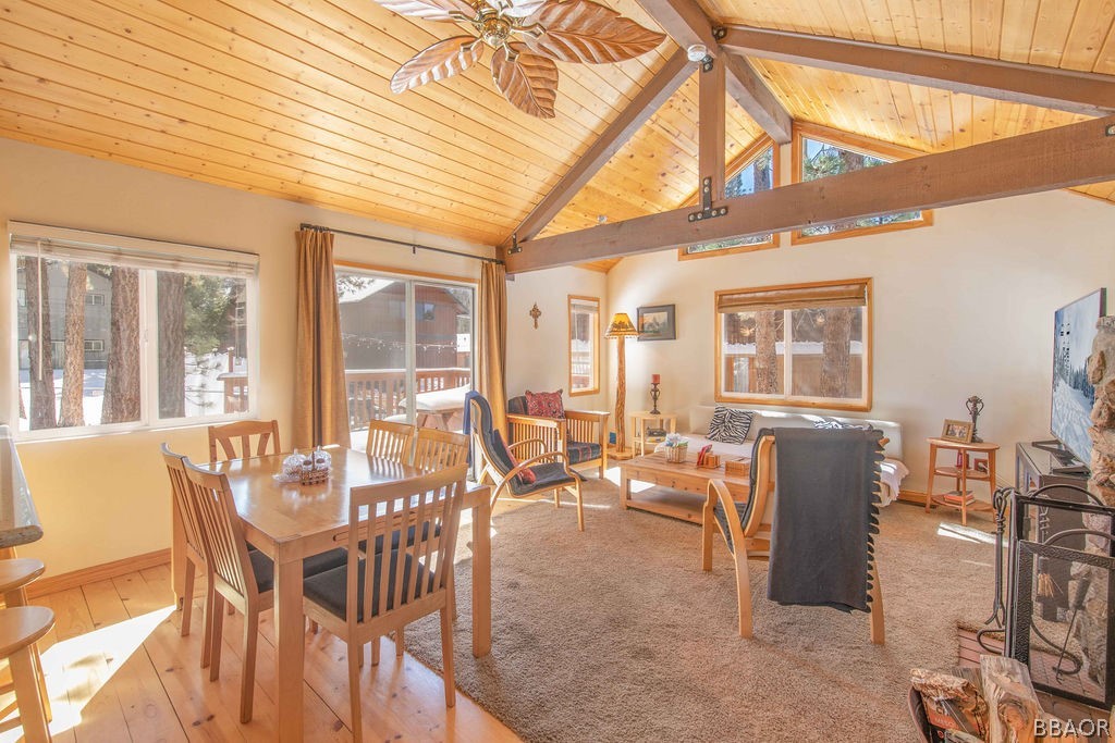 43132 Moonridge Road Big Bear Lake, CA 92315 - Photo 7 of 41 a dining room with furniture a chandelier and wooden floor