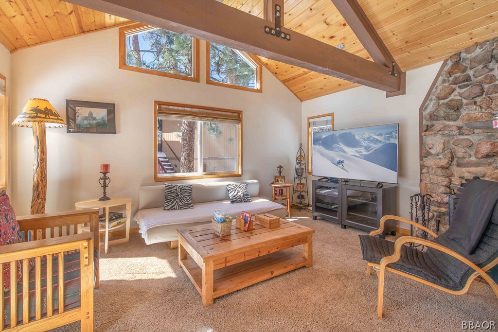 43132 Moonridge Road Big Bear Lake, CA 92315 - Photo 9 of 41 a bedroom with furniture and a fireplace