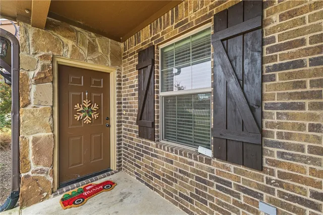a view of a door and a wooden door