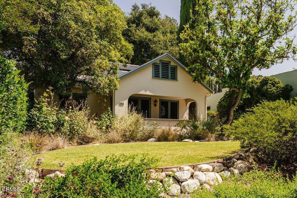 689 East Woodbury Road Altadena, CA 91001 - Photo 1 of 1 a front view of house with yard and trees around