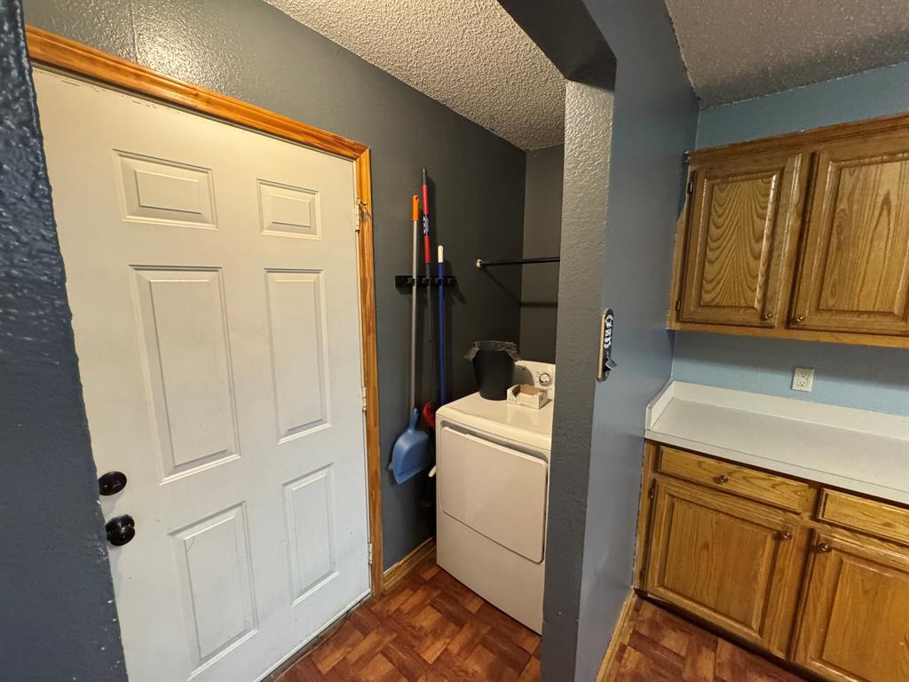 705 East James Street Wills Point, TX 75169 - Photo 10 of 26 a room with storage and utility