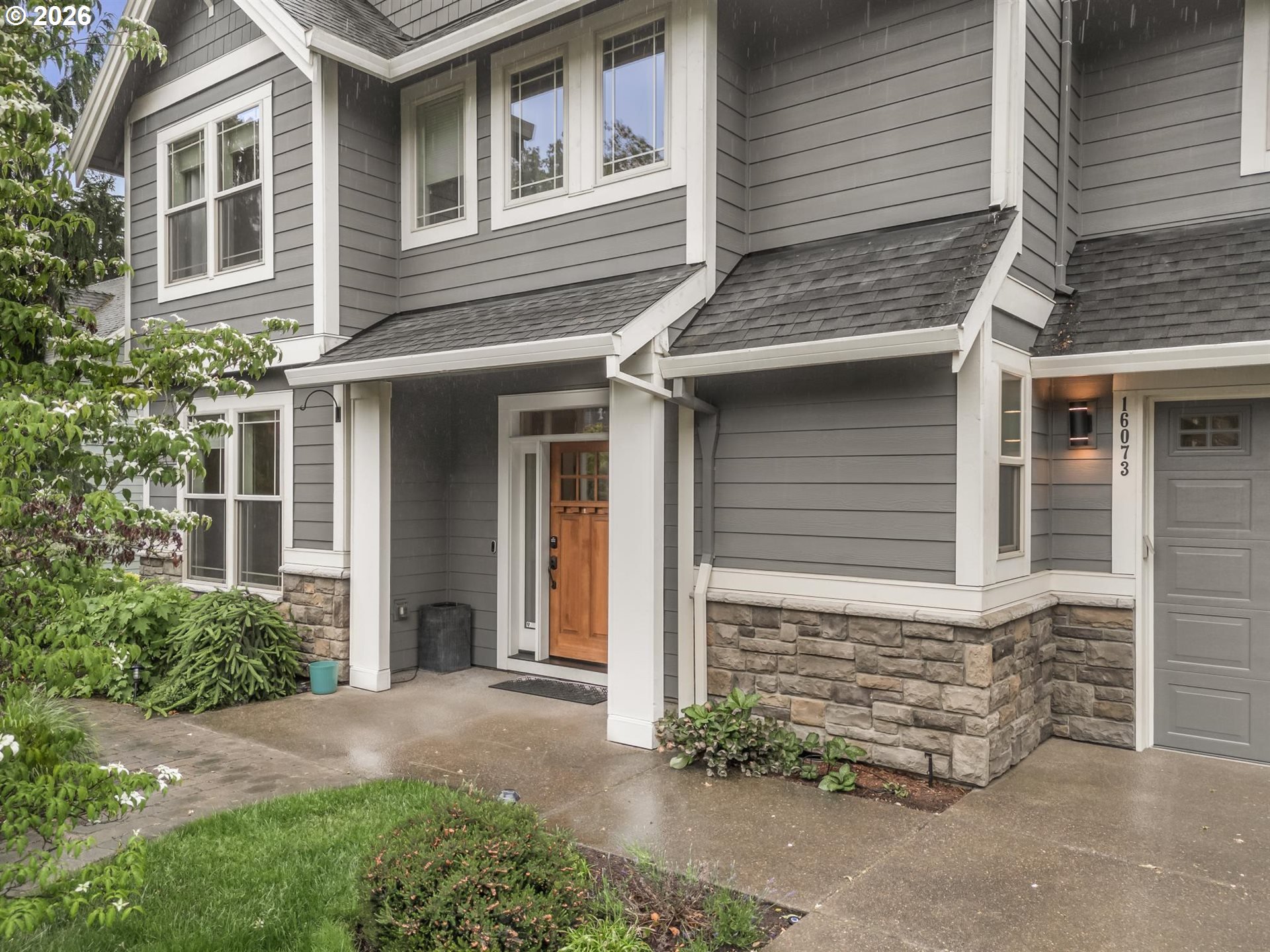 16073 Southeast Pinot Road Milwaukie, OR 97267 - Photo 4 of 44 front view of a house with an window