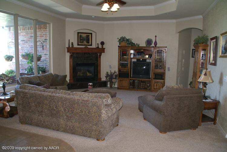 6910 Thunder Road Amarillo, TX 79119 - Photo 8 of 28 living room 3
