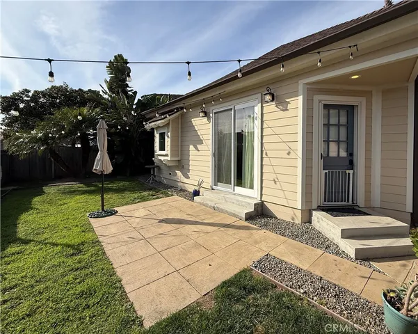 a house view with a backyard space