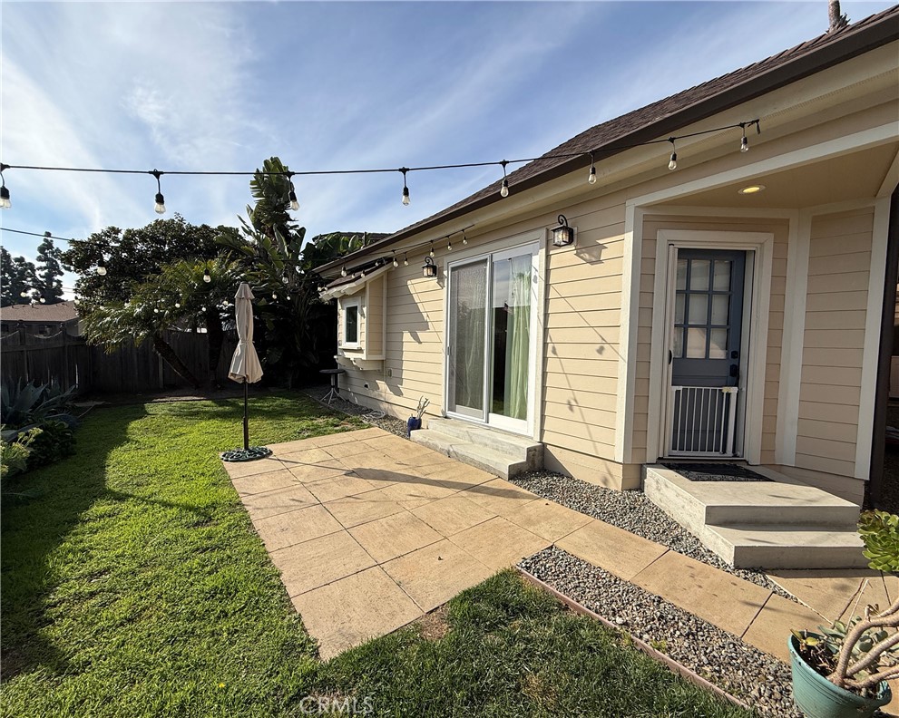 25955 Via Del Rey, Unit B San Juan Capistrano, CA 92675 - Photo 19 of 20 a house with yard in front of it