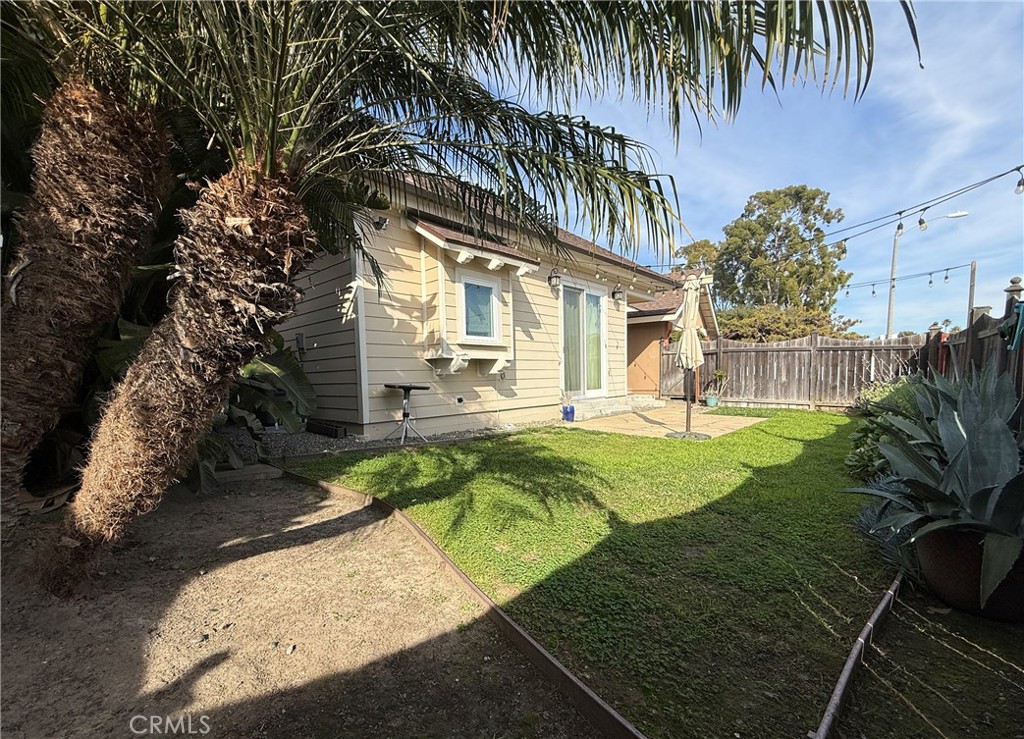 25955 Via Del Rey, Unit B San Juan Capistrano, CA 92675 - Photo 3 of 20 a front view of a house with garden