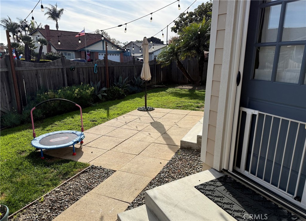 25955 Via Del Rey, Unit B San Juan Capistrano, CA 92675 - Photo 4 of 20 a view of a backyard with sitting area
