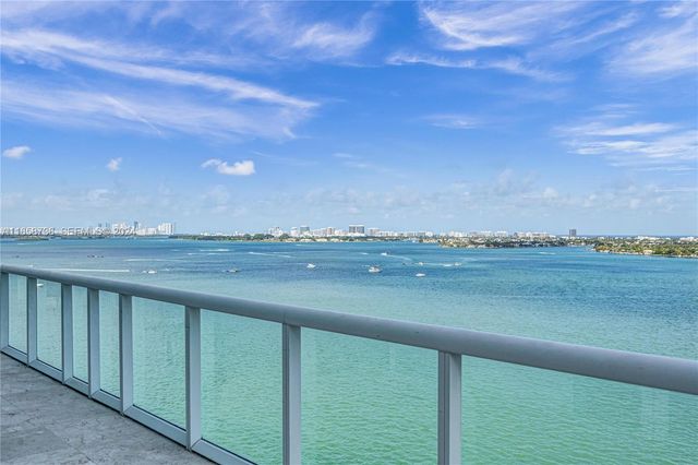 a view of a balcony with lake view