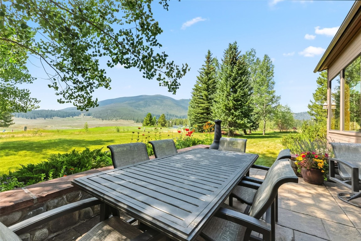 272 Penstemon Road Keystone, CO 80435 - Photo 15 of 50 an outdoor sitting area with furniture and garden