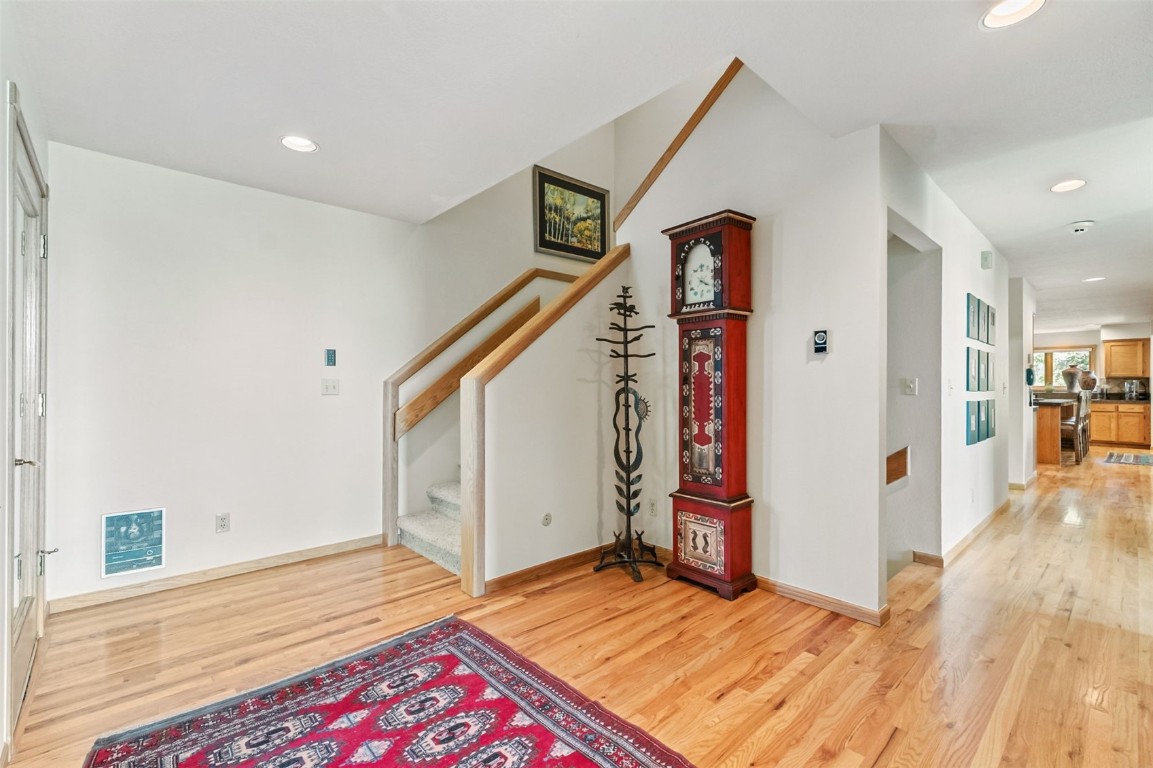 272 Penstemon Road Keystone, CO 80435 - Photo 22 of 50 a view of an entryway with wooden floor and livingroom