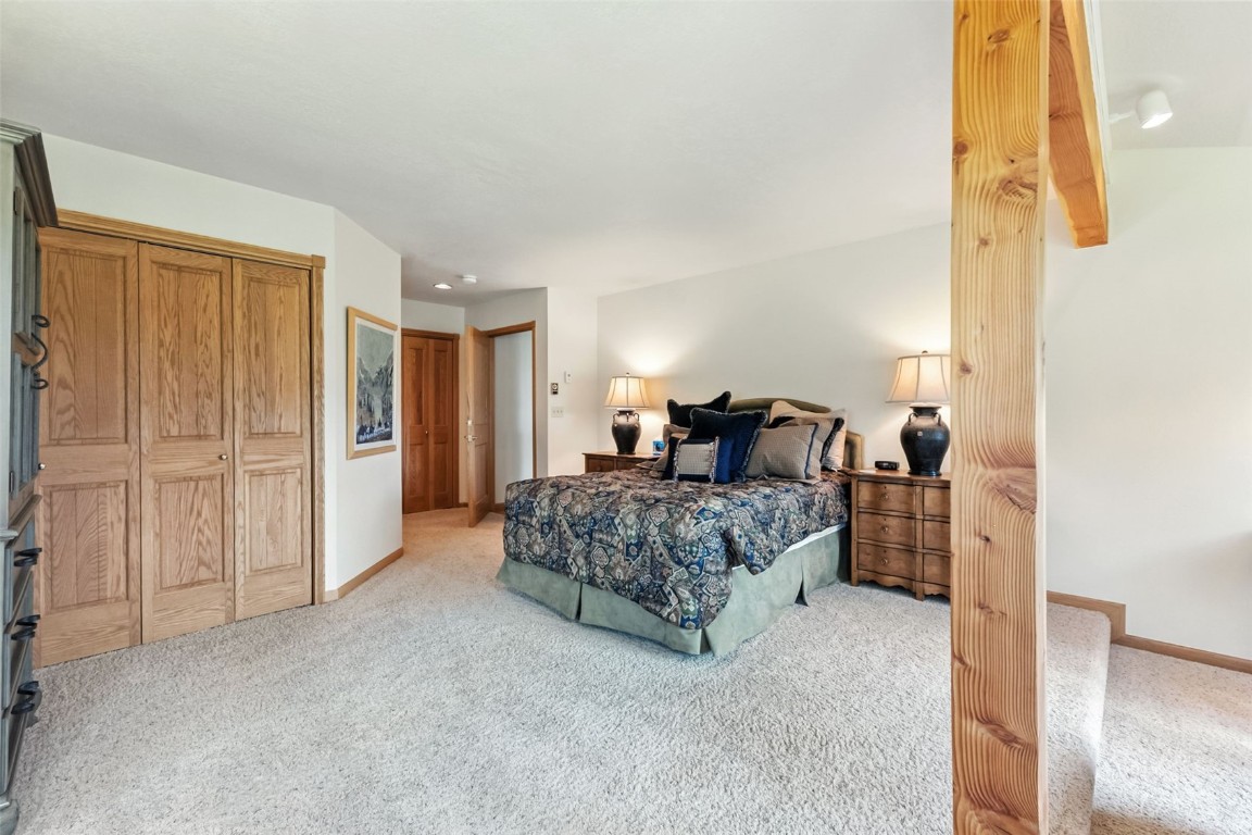 272 Penstemon Road Keystone, CO 80435 - Photo 24 of 50 a bedroom with a bed and a cabinets
