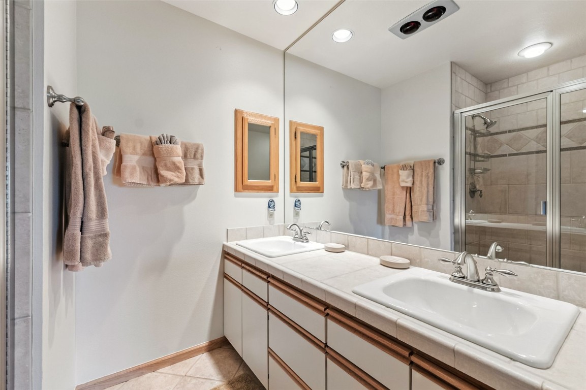 272 Penstemon Road Keystone, CO 80435 - Photo 29 of 50 a bathroom with a sink and a mirror