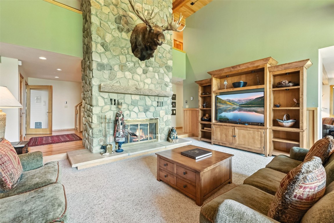 272 Penstemon Road Keystone, CO 80435 - Photo 3 of 50 a living room with furniture and a floor to ceiling window