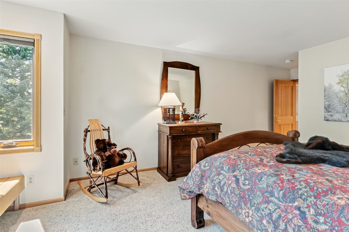 272 Penstemon Road Keystone, CO 80435 - Photo 39 of 50 a bedroom with a bed and a window