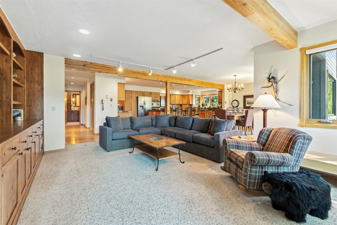 272 Penstemon Road Keystone, CO 80435 - Photo 5 of 50 a living room with furniture and a flat screen tv