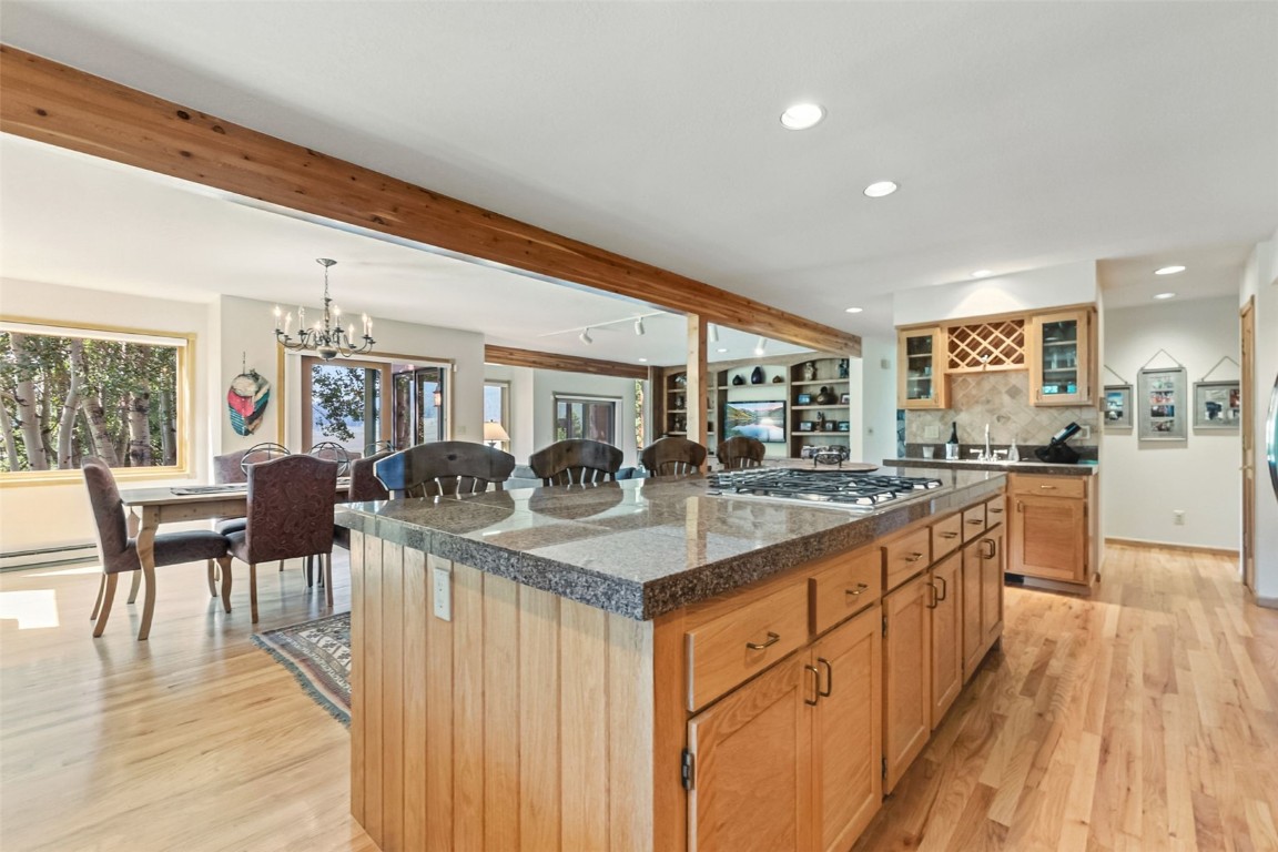 272 Penstemon Road Keystone, CO 80435 - Photo 9 of 50 a kitchen with lots of counter top space and living room