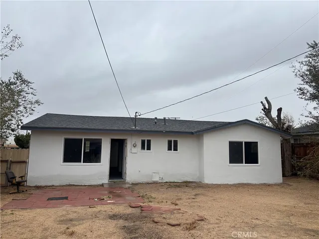 a front view of house with garage