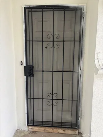 a view of a black and white door