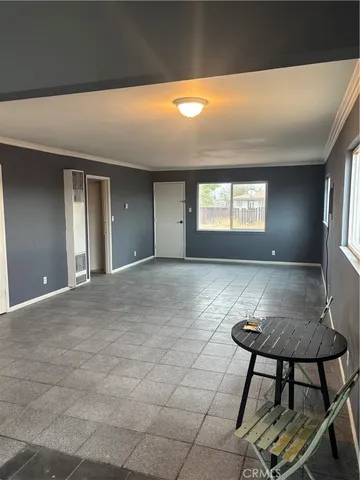 a view of livingroom and dining area with furniture